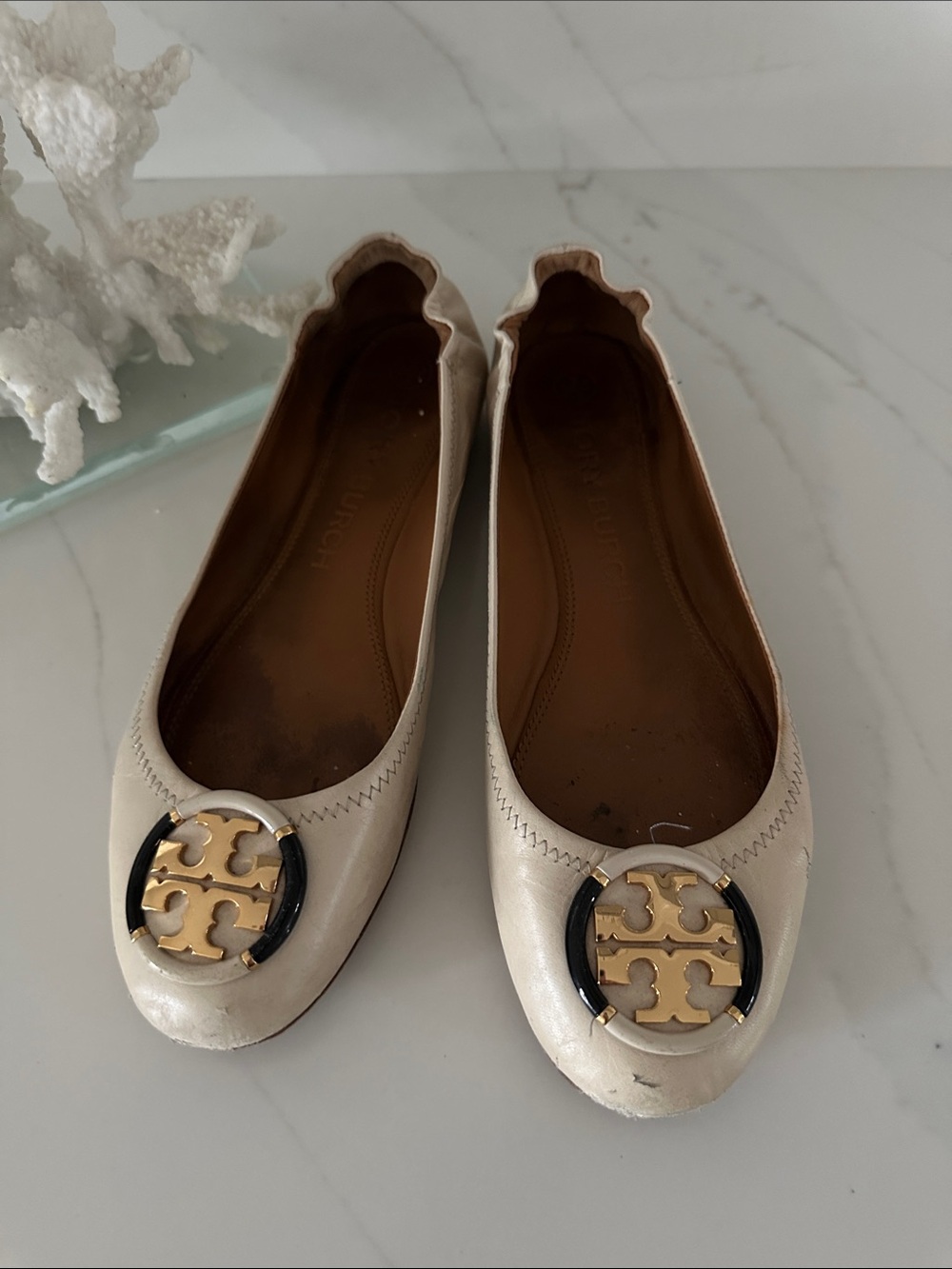 Tory Burch Cream Leather Logo Ballet Flats with Black & Gold Emblem
